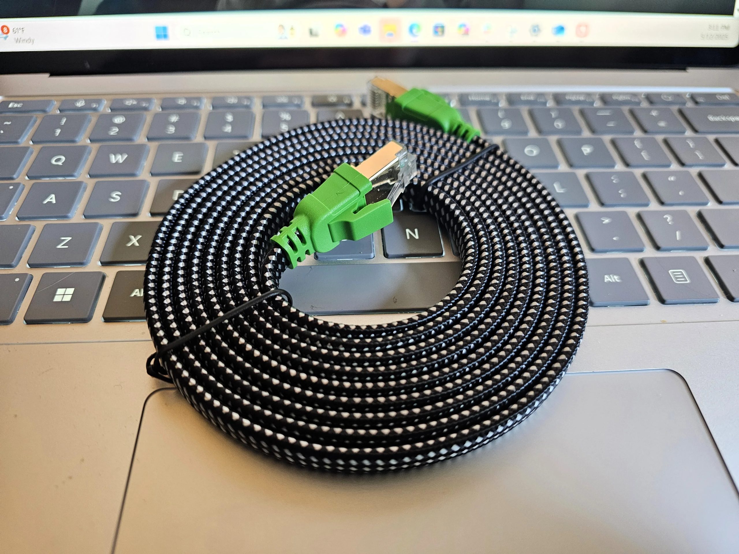 Cat8 Ethernet cable on keyboard